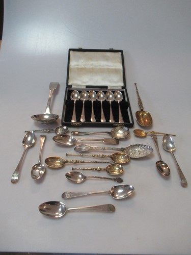 Lot 235 - A collection of silver flatware including a...