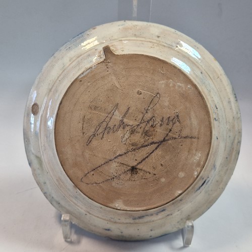Lot 46 - Anton Lang (1875-1938), an Oberammergau pottery plate, 1922
