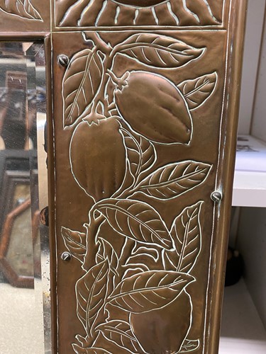 Lot 152 - A Keswick School of Industrial Arts brass framed wall mirror