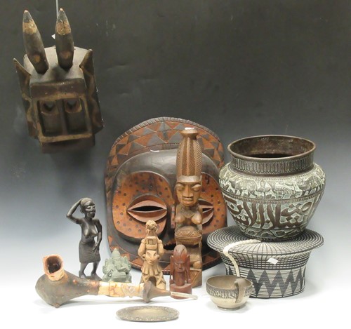 Lot 127 - Various African tribal wooden masks and...