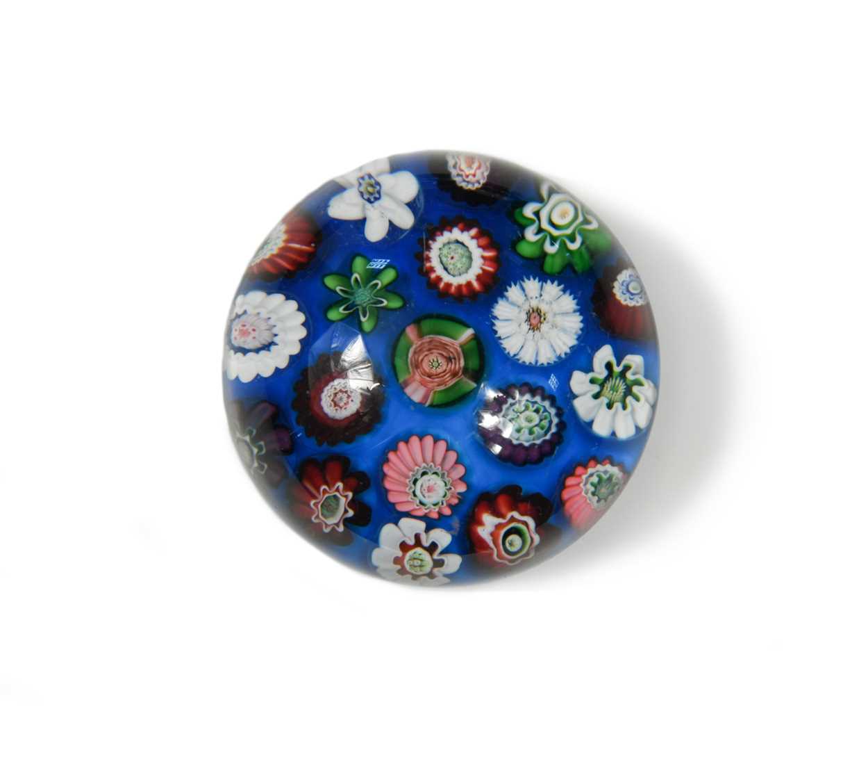 Lot 1 - A small Clichy spaced millefiori glass paperweight