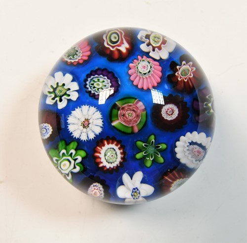 Lot 1 - A small Clichy spaced millefiori glass paperweight