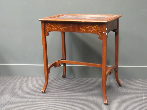 Lot 426 - An Edwardian marquetry glass top display table,...