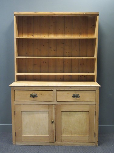 Lot 473 - A stripped pine shelf top dresser, 221.5 x 145...