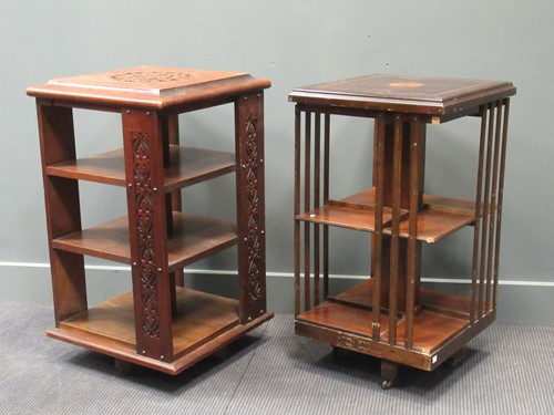 Lot 425 - Two square section revolving bookcases, one...