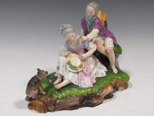 Lot 25 - A Continental figure group of a courting...