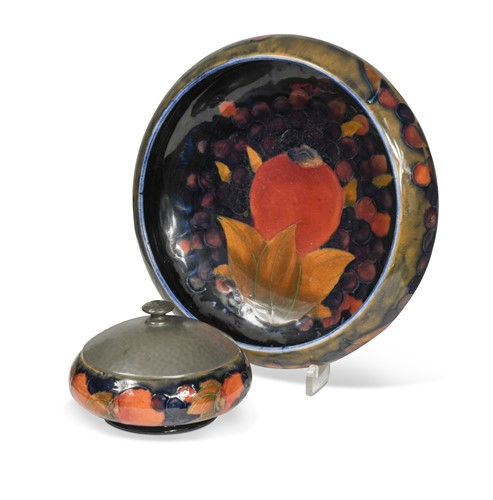 Lot 27 - William Moorcroft for Liberty & Co., a Pomegranate pattern powder box and cover