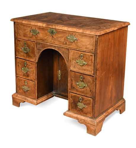 Lot 349 - A George II walnut kneehole desk