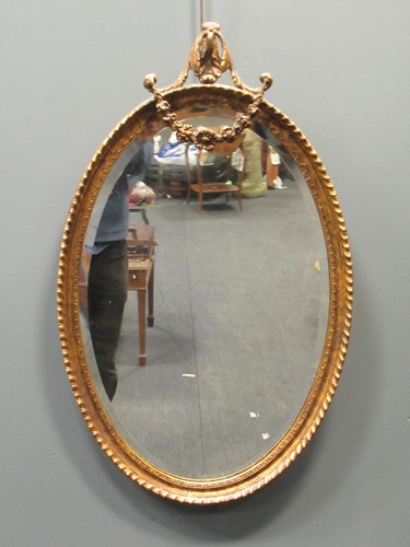 Lot 421 - Giltwood oval mirror, 75 x 46cm