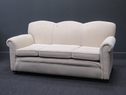 Lot 476 - An early 20th century three seater settee on...