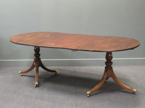 Lot 401 - A Regency-style mahogany D-end dining table...