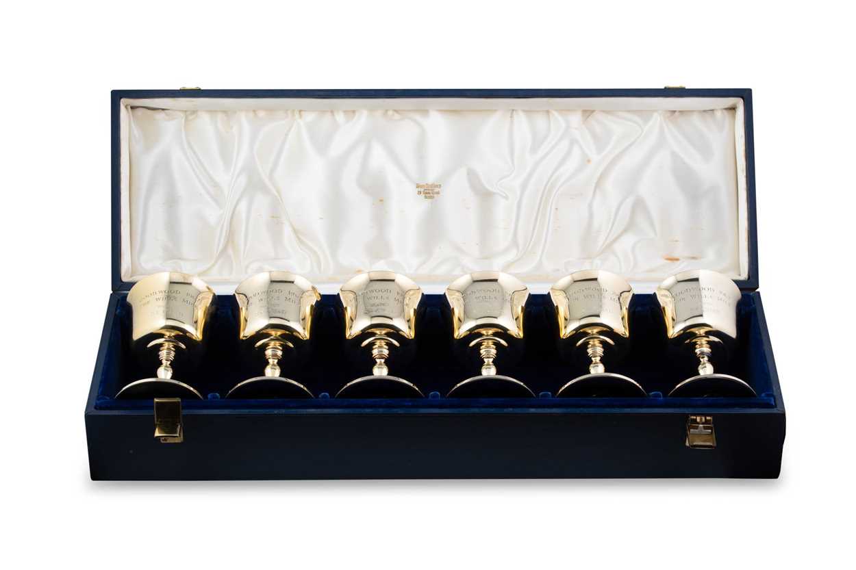 Lot 645 - A cased set of six Elizabeth II silver gilt goblets