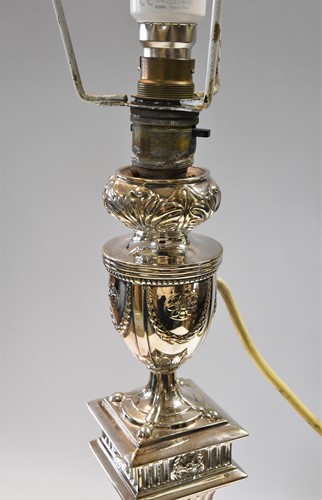 Lot 449 - A Victorian silver plated candlestick converted to a table lamp