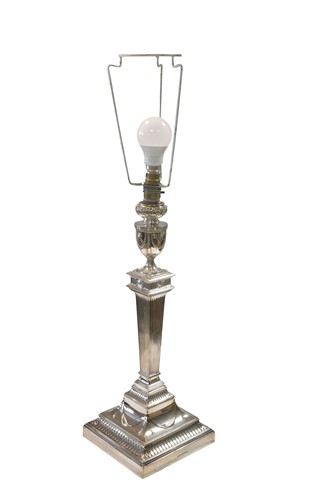 Lot 449 - A Victorian silver plated candlestick converted to a table lamp