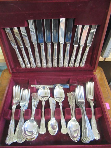 Lot 209 - A canteen of silver plated cutlery, the knife...
