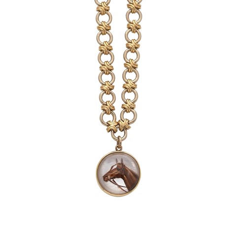 Lot 160 - A reverse intaglio painted crystal pendant and chain