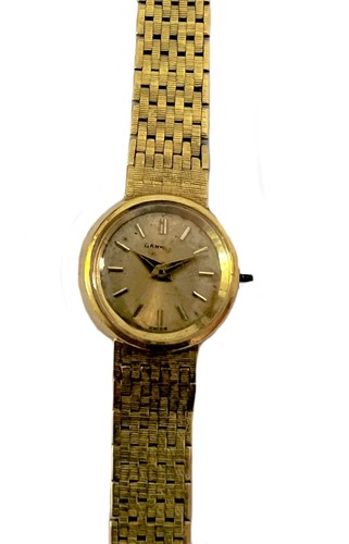 Lot 320 - Unsigned, retailed by Garrard & Co. - An 18ct gold wristwatch