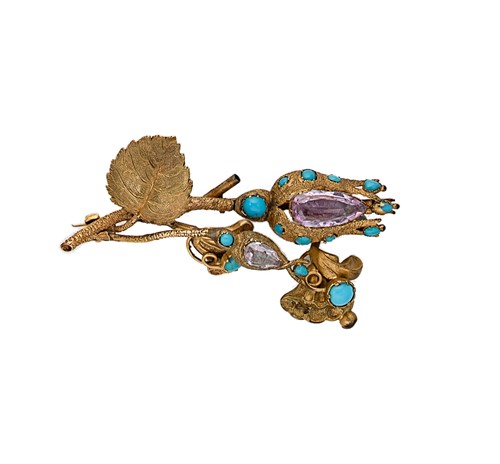 Lot 121 - A 19th century topaz and turquoise floral brooch