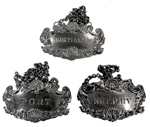 Lot 418 - A trio of 19th century Scottish silver decanter labels