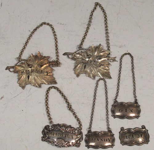 Lot 224 - A collection of silver and unmarked bottle...