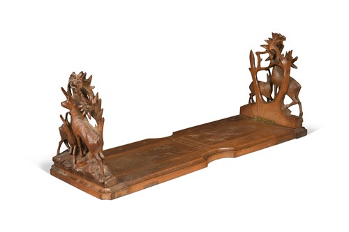 Lot 70A - A Black Forest carved wood book slide, early 20th century