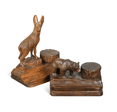 Lot 703 - Two Black Forest carved wood ink stands, early 20th century