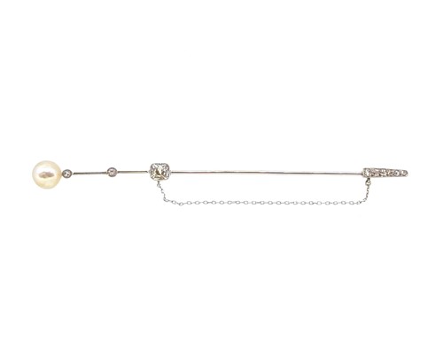 Lot 199 - A natural saltwater pearl and diamond stick pin