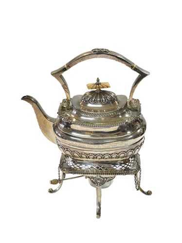 Lot 616 - A George V silver spirit kettle and stand