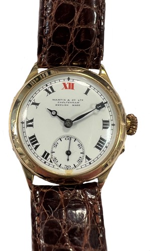 Lot 323 - Unsigned, retailed by Martin & Company, Cheltenham - An 18ct gold wristwatch