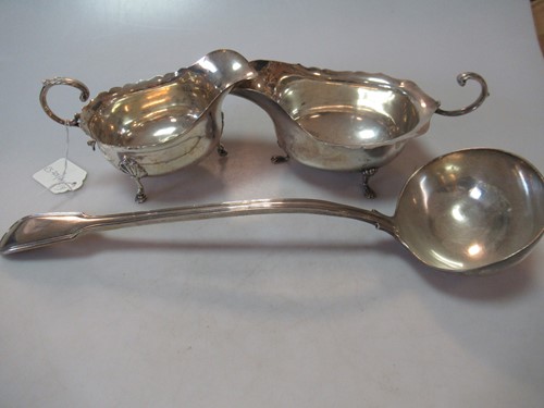 Lot 213 - Two Chester marked silver sauce boats together...
