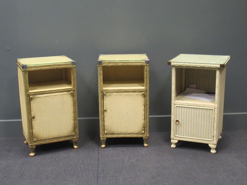Lot 470 - A near pair of modern rattan bedside cabinets...