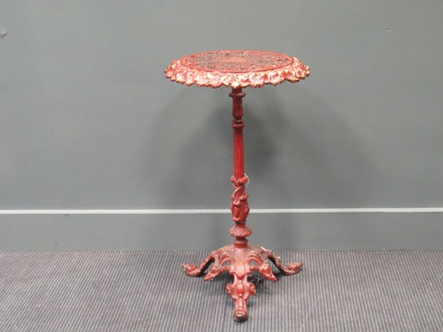 Lot 376 - A Coalbrookdale cast iron tripod table,...