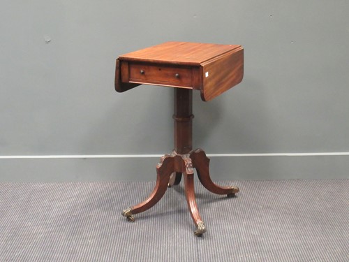 Lot 479 - A 19th century mahogany work/ lamp table, with...