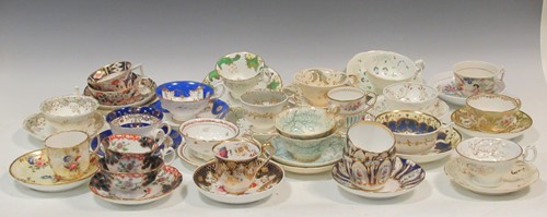 Lot 21 - A collection of English porcelain cups and...