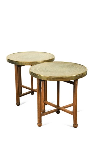 Lot 570 - A pair of Moroccan brass topped occasional tables, 20th century