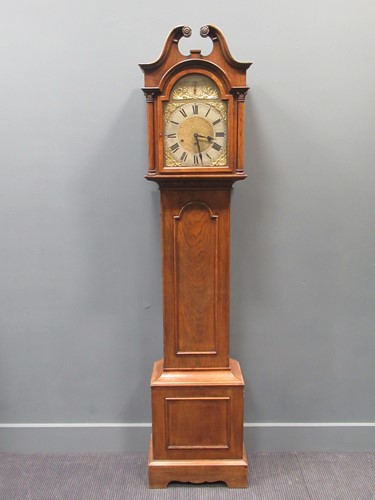 Lot 152 - A George III style oak longcase clock with a...