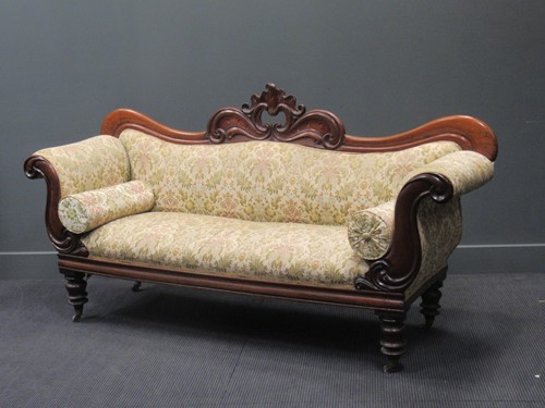 Lot 434 - A Victorian walnut double ended sofa, with...