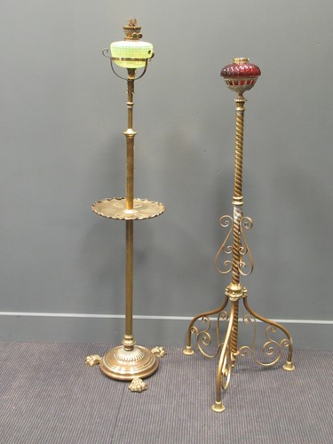 Lot 399 - Two Victorian brass oil standard lamps, 138cm...