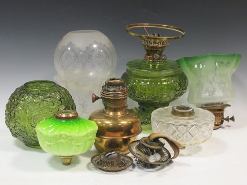 Lot 114 - A collection of Victorian oil lamp reservoirs...