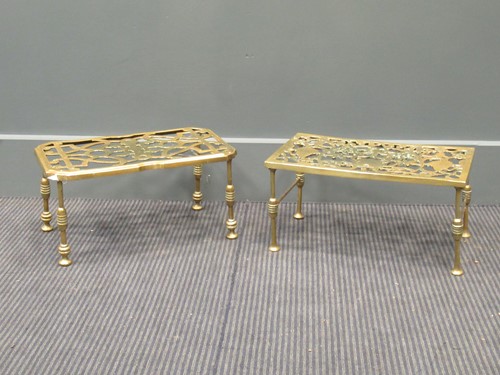Lot 484 - Two George III brass trivets