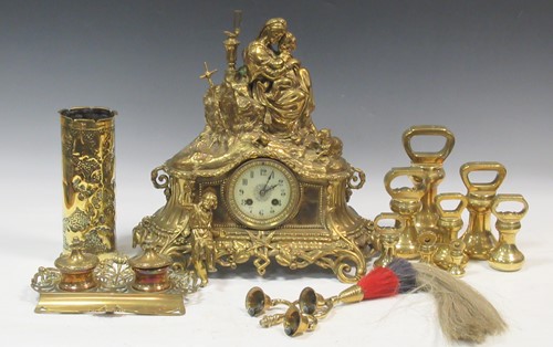 Lot 98 - A 19th century brass mantle clock, a set of...