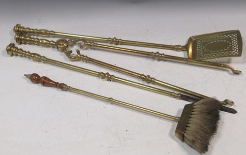 Lot 495 - A set of brass fire irons and an associated brush