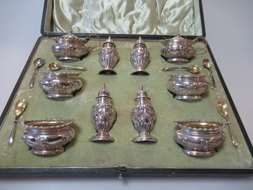 Lot 207 - A cased silver 10-piece cruet set by Walker &...
