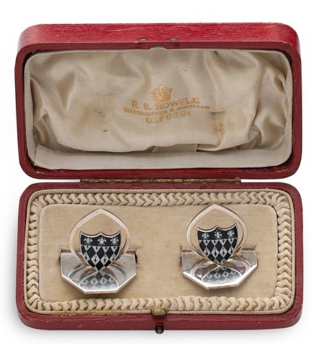 Lot 400 - A cased pair of early 20th century silver and enamel menu/place card holders