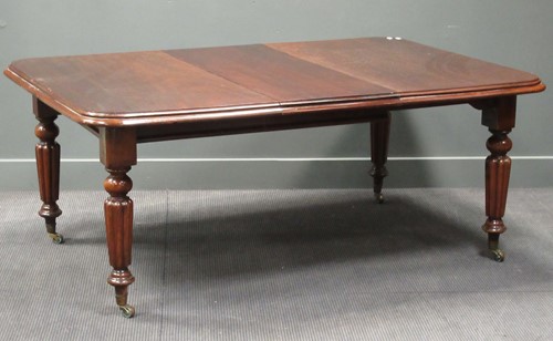 Lot 501 - A 19th century mahogany extending dining table...