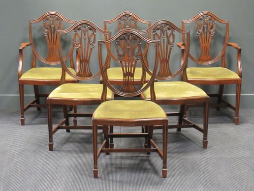 Lot 375 - A set of six Hepplewhite style mahogany dining...