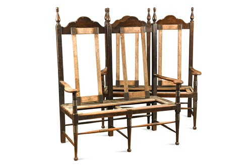 Lot 144 - William Birch (1840-1954), probably for Liberty, a rare pair of oak settles