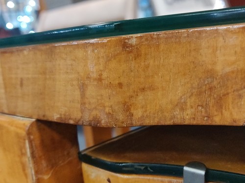 Lot 178 - An Art Deco birds eye maple nest of tables, in the manner of Epstein