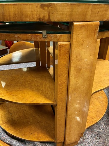 Lot 178 - An Art Deco birds eye maple nest of tables, in the manner of Epstein