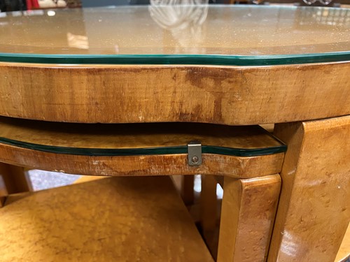 Lot 178 - An Art Deco birds eye maple nest of tables, in the manner of Epstein